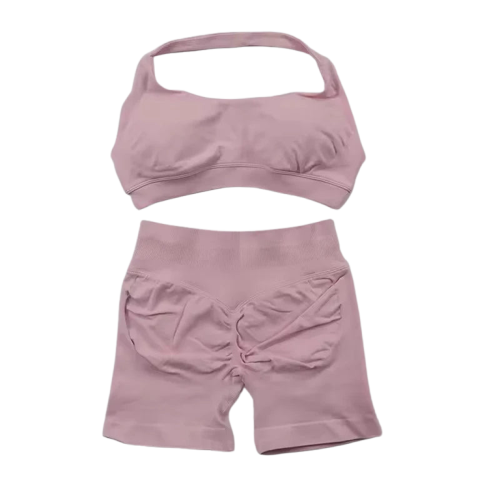 Pink women's fitness bra shorts set from Xooie Fit, ideal for workouts and activewear.