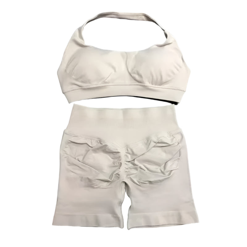 White women's fitness bra shorts set by Xooie Fit for comfortable workouts and active lifestyles