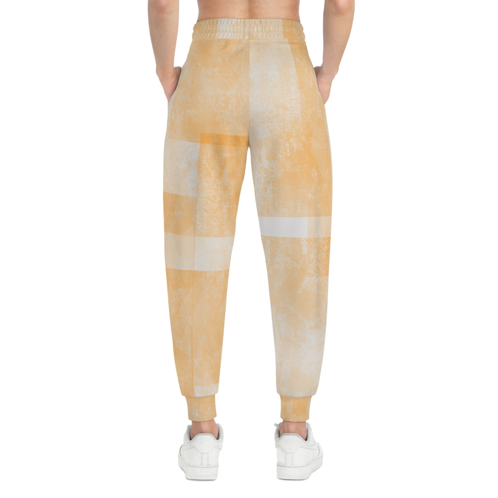 Peach tie-dye joggers with elastic waistband and back panel stripe pattern, cuffed hems
