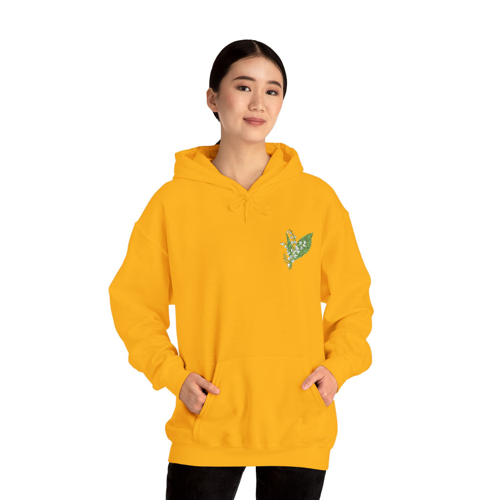 Gold hoodie with green leaf embroidery on chest and hood drawstrings