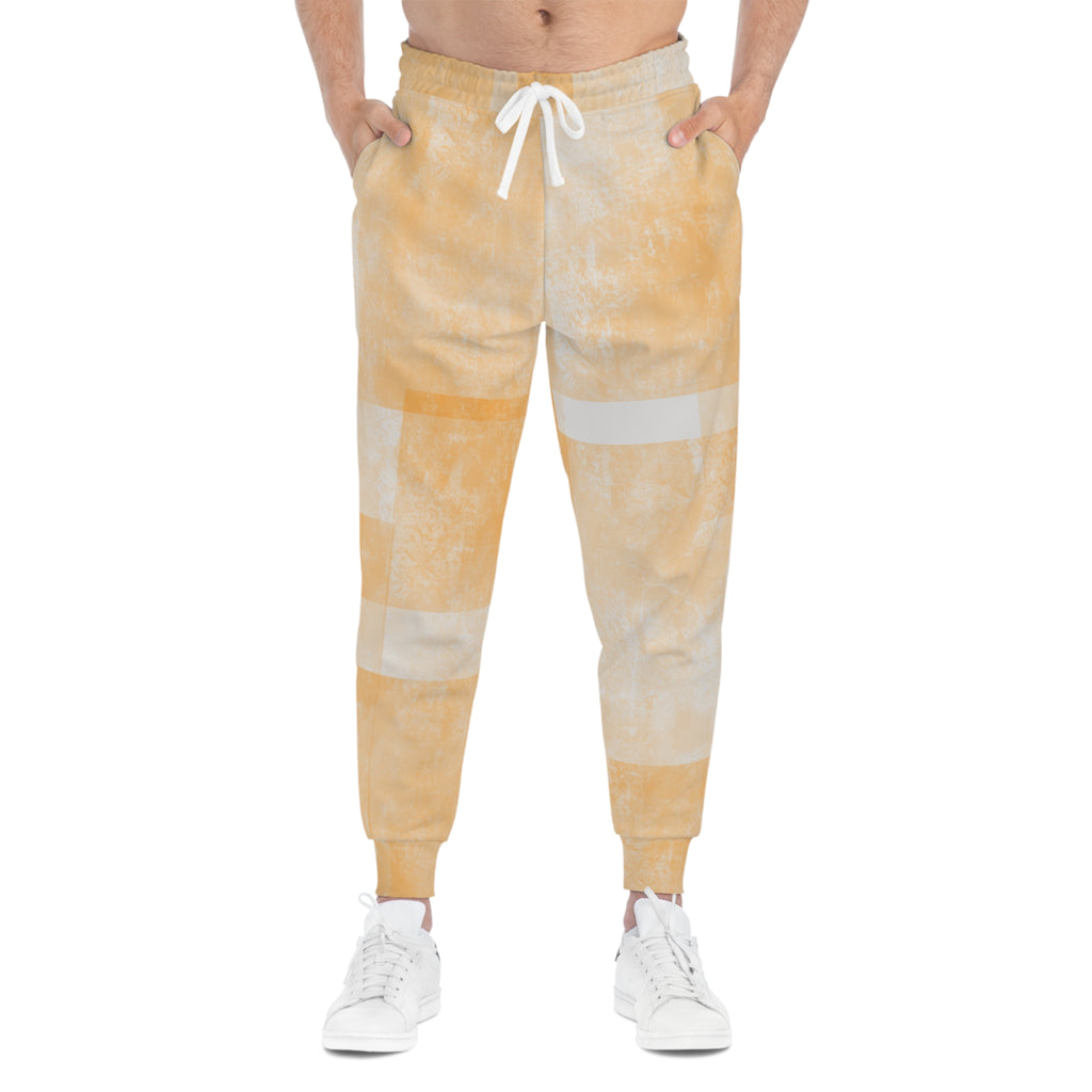 Peach tie-dye athletic joggers with white drawstring, cuffed hems, and striped panels