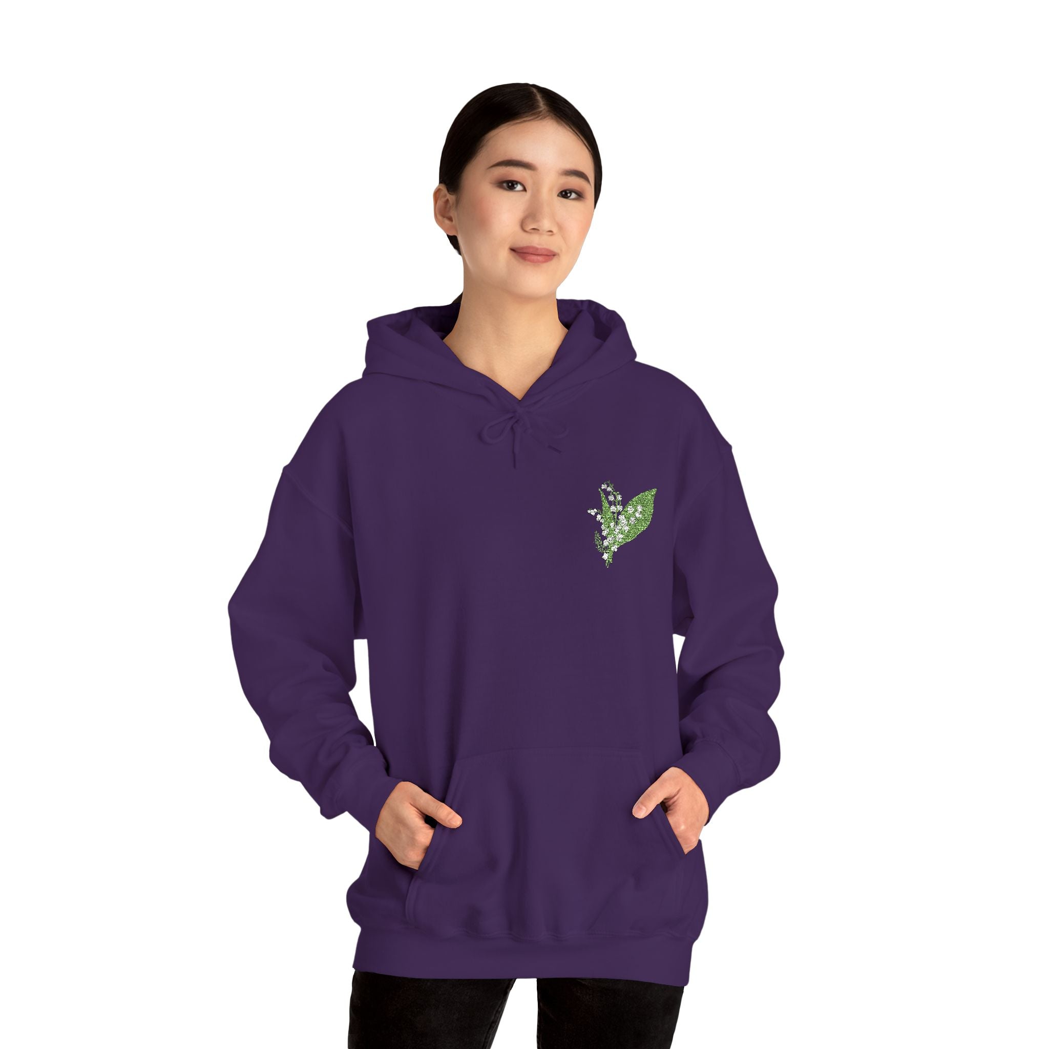 Purple green leaf embroidered hoodie on model with drawstring hood and kangaroo pocket