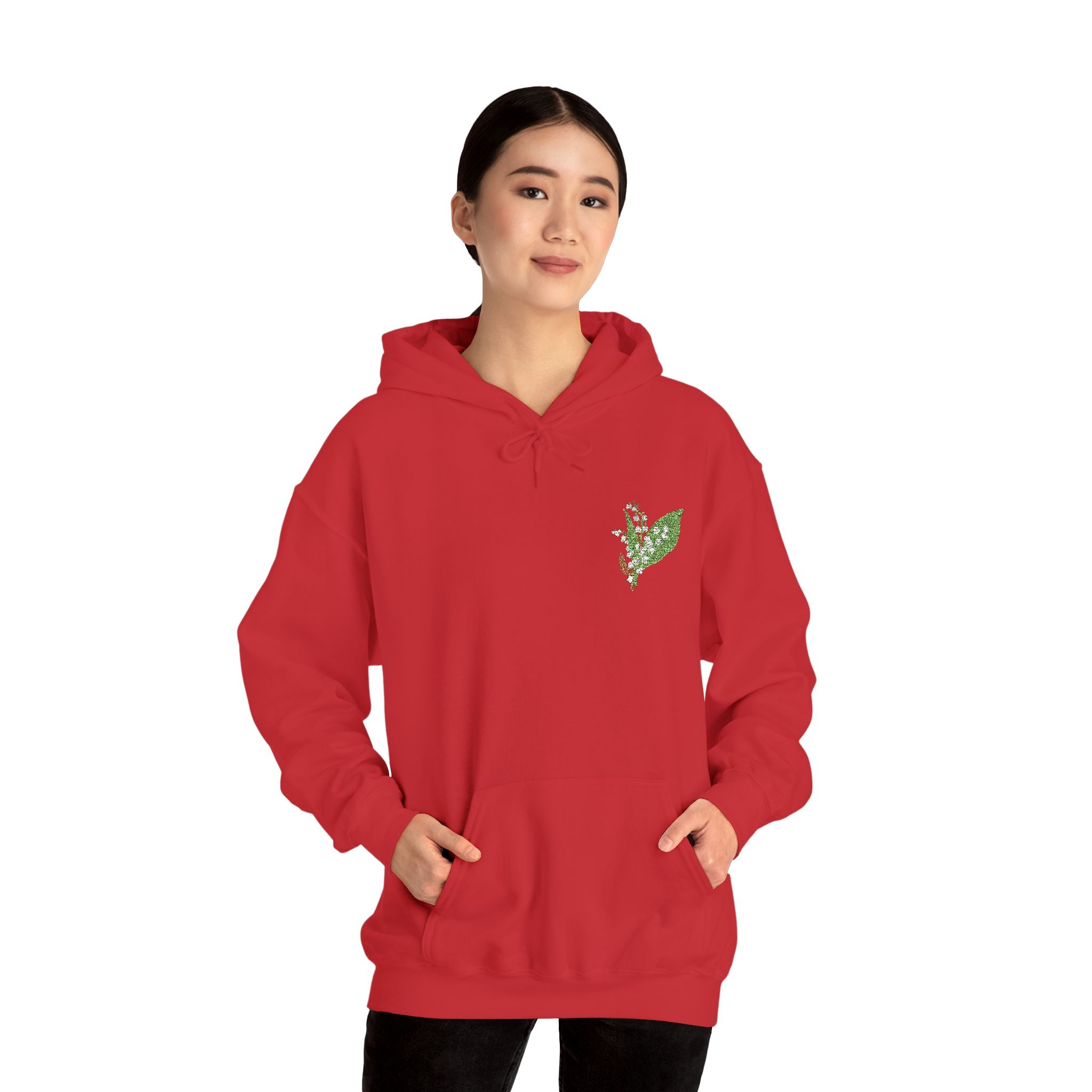 Red hooded sweatshirt with green leaf embroidery on the chest
