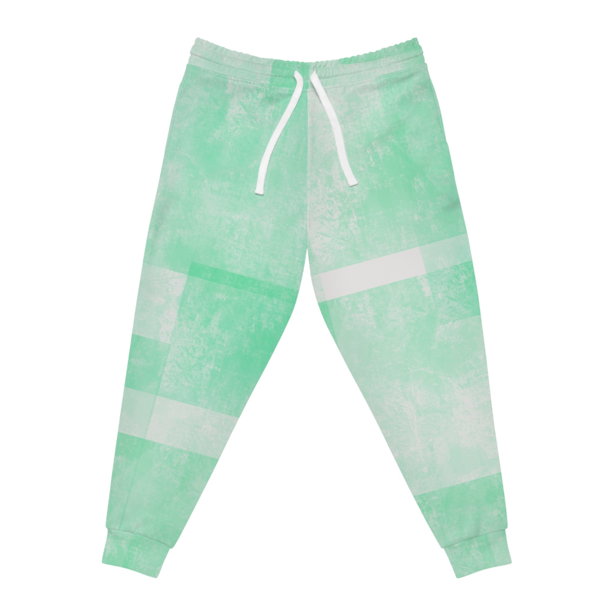 Mint green jogger pants laid flat, drawstring waistband, stripe block pattern