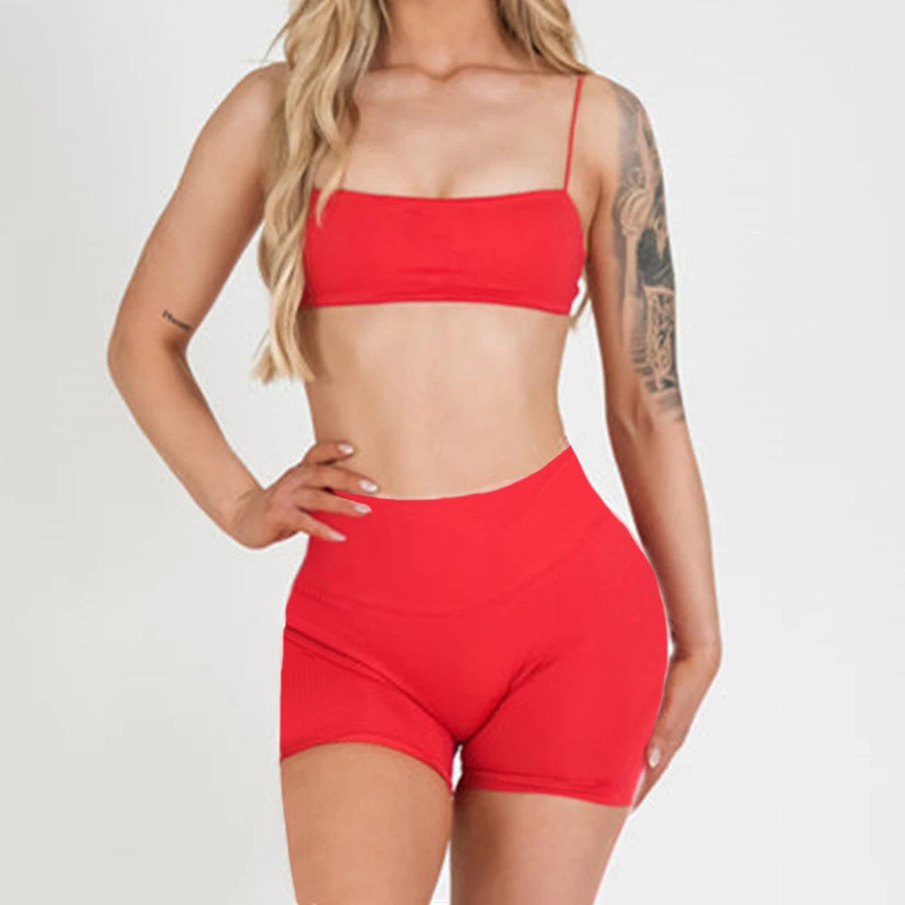 Red thin-strap bra and high-waist matching active shorts set