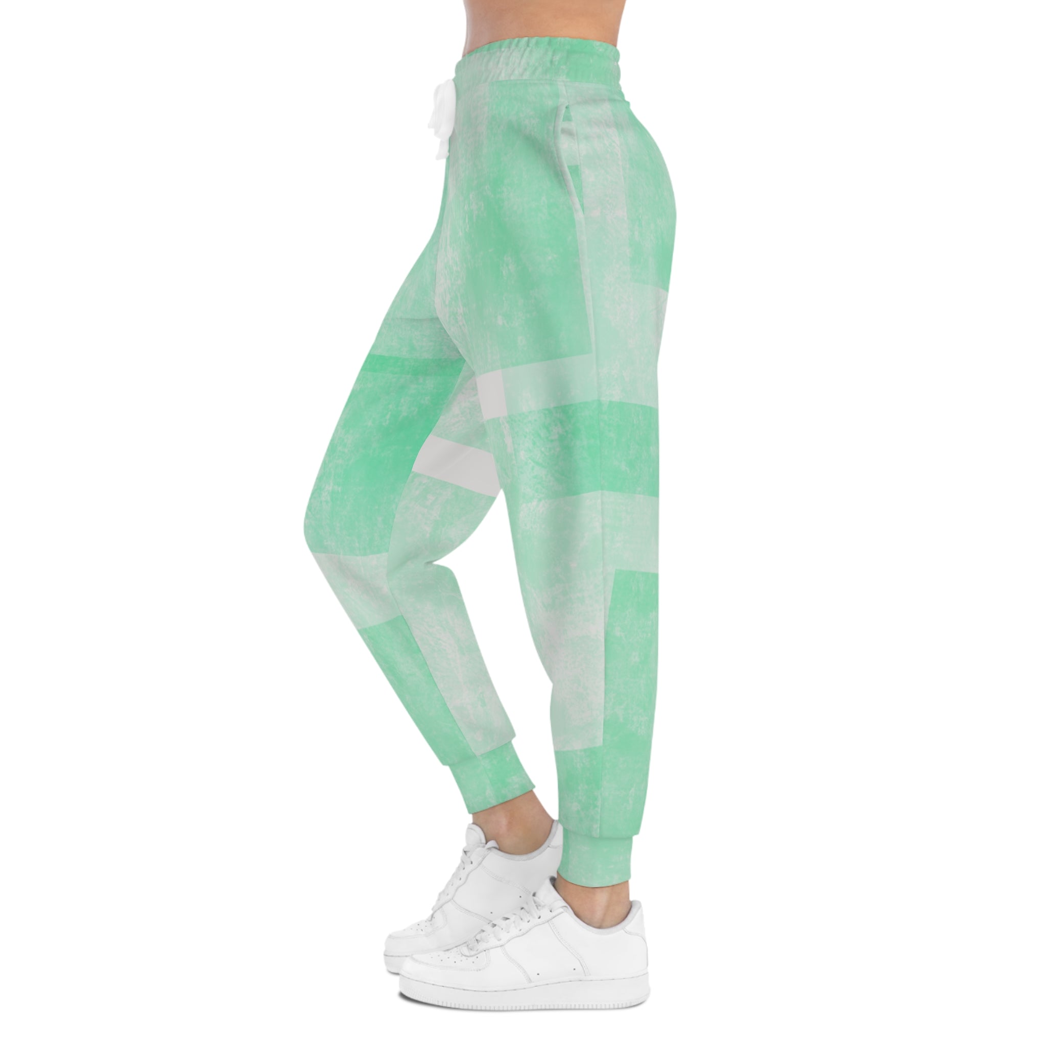 Back view mint green tie-dye joggers with elastic waistband and stripe blocks
