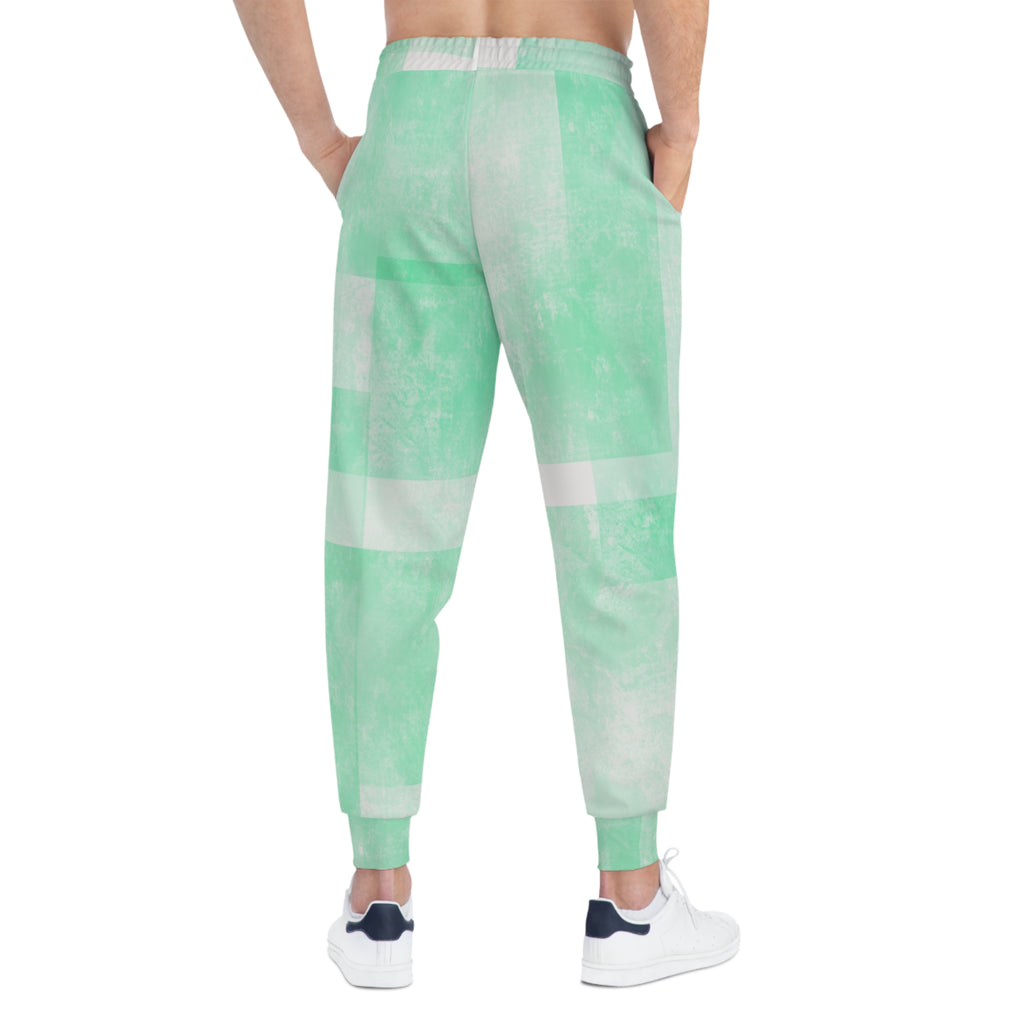 Side view mint green athletic joggers with stripe block print and cuffed hems