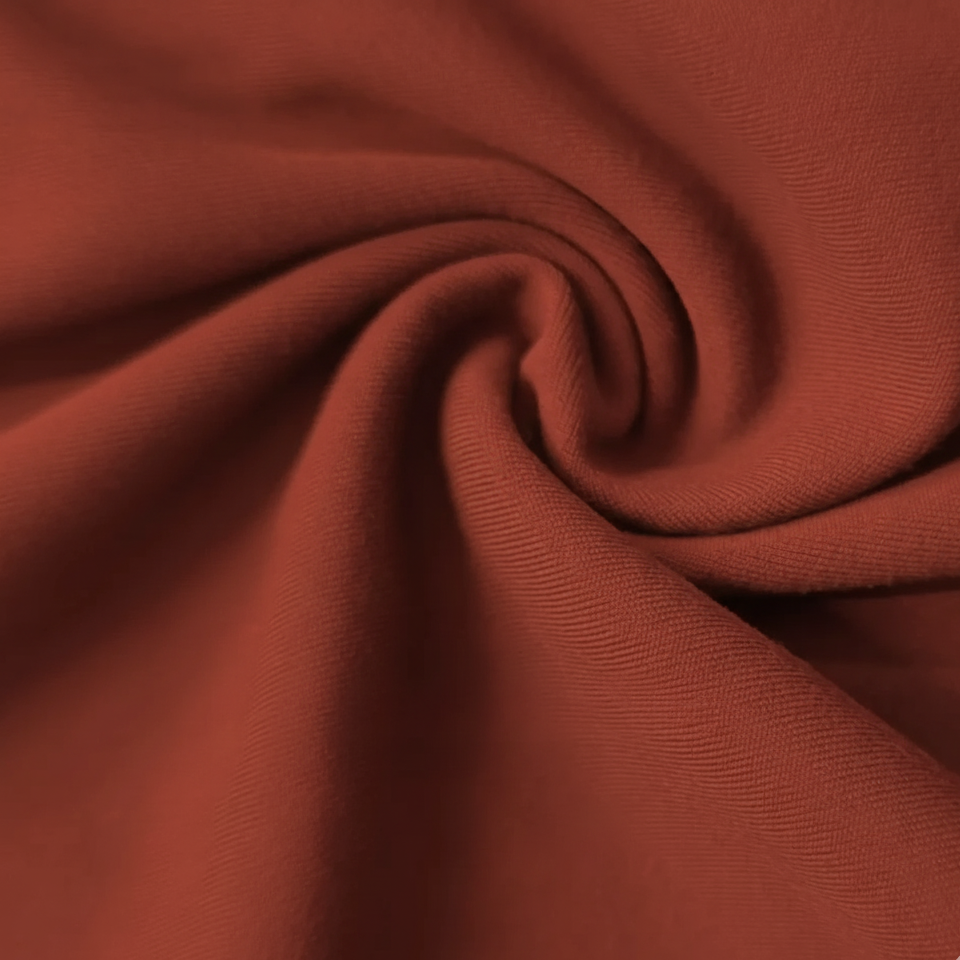 Close-up of brown fabric with a subtle texture