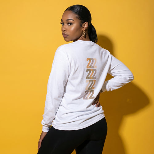 Unisex long-sleeve graphic tee in white with “222” angel numbers on back