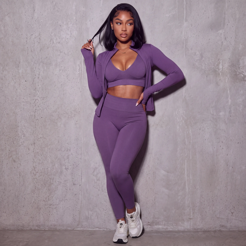 Purple sport bra, leggings, and matching zip jacket set, front view