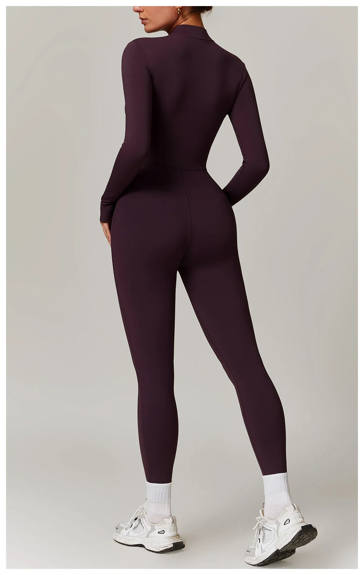Fleece lined workout jumpsuit women in dark purple for comfortable fitness sessions