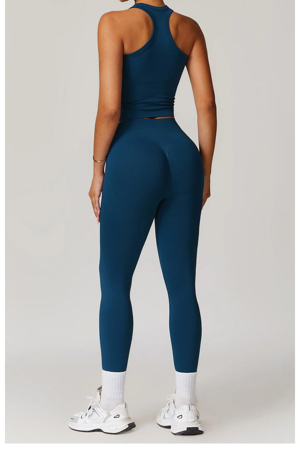 Royal blue racerback tank and matching leggings workout set, fitted ankle length