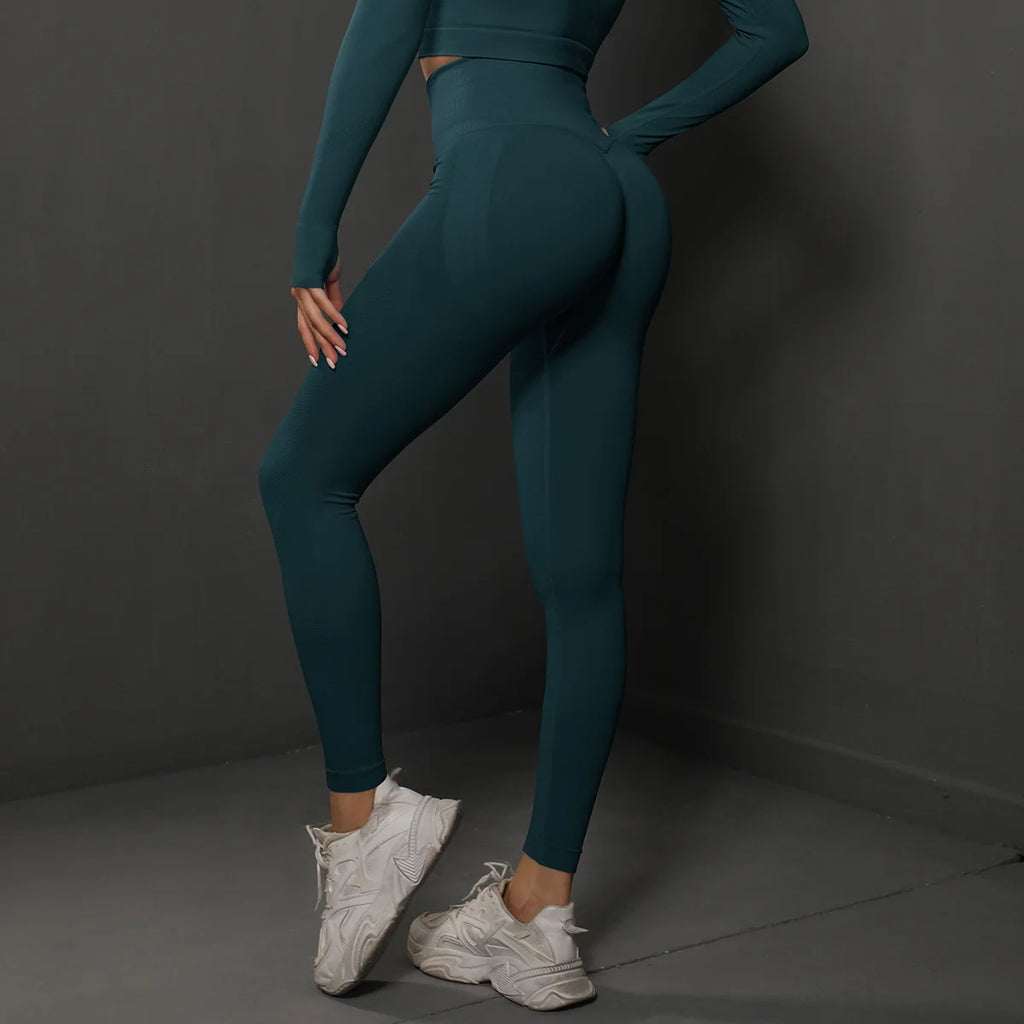 High-waist yoga leggings, dark teal, front view with high-rise waistband