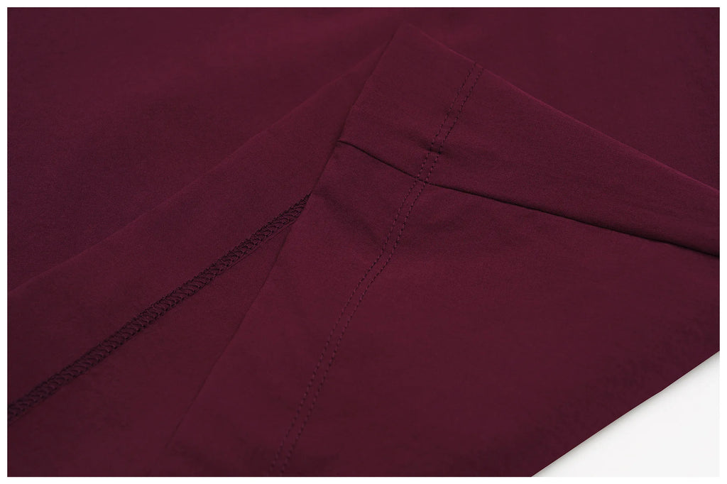 Women's burgundy wide-leg pants with stitched seams and elastic waistband