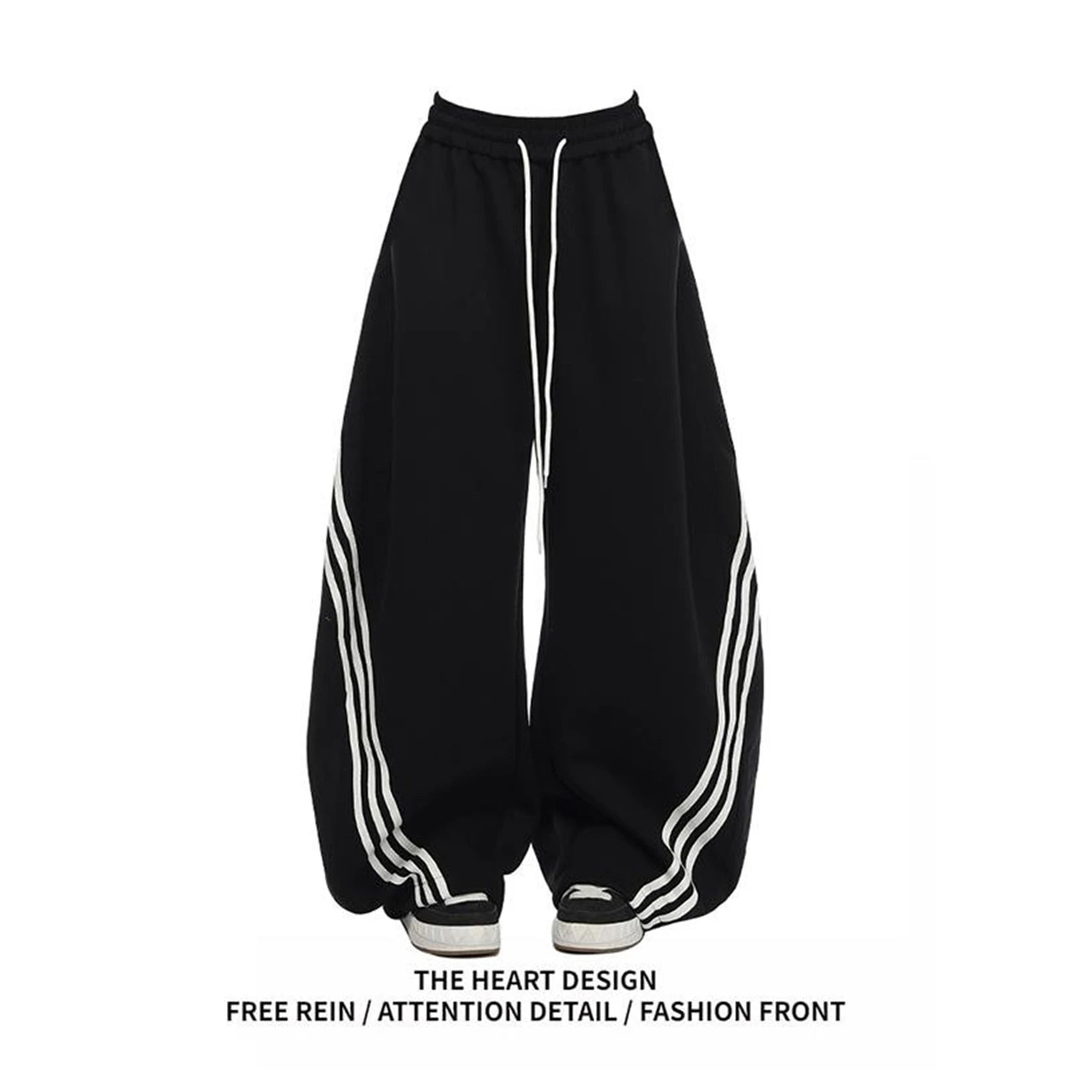 Black wide-leg sweatpants with white side stripes and elastic drawstring waist