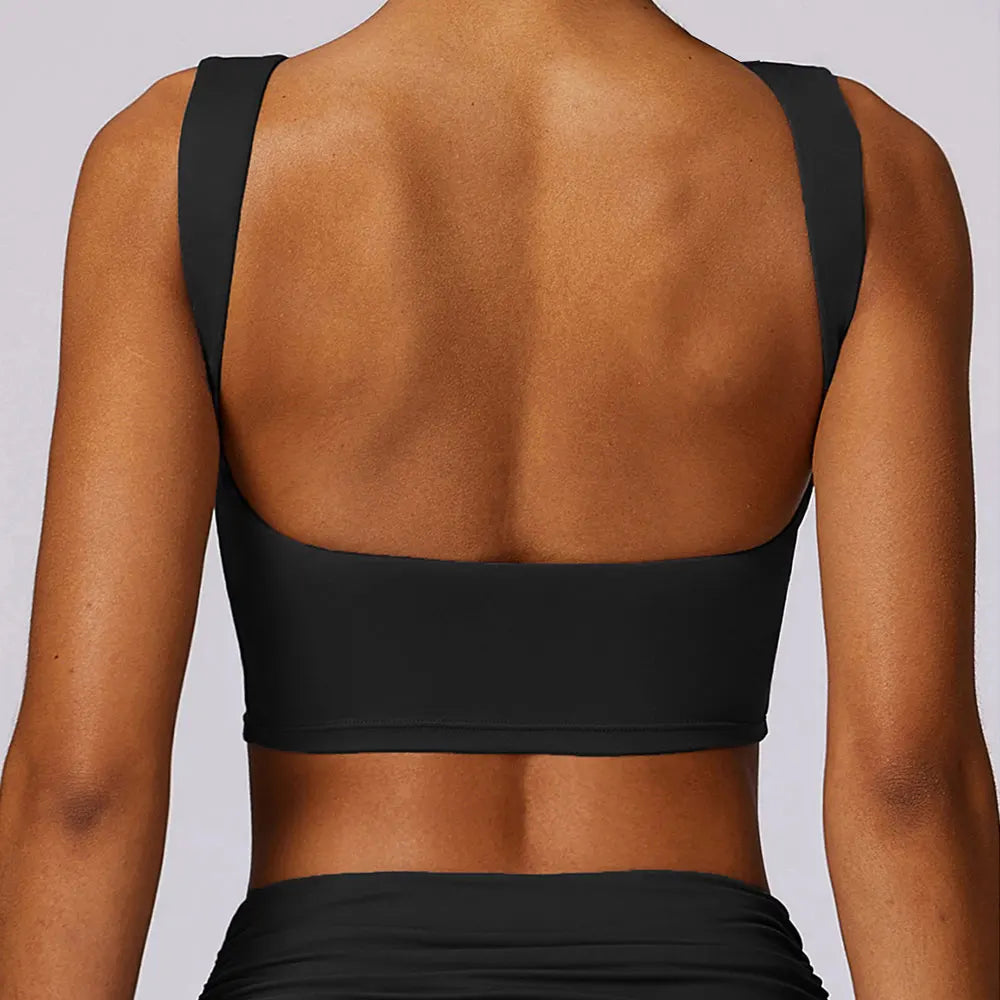 Women's black sports bra crop top, wide back straps, scoop back design