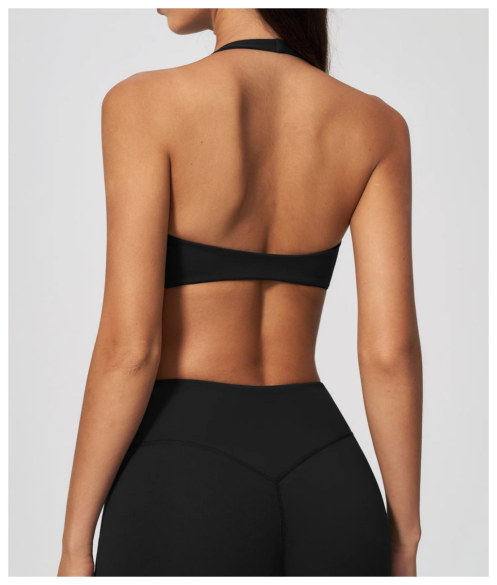 Back view halter yoga bra with open back and dark elastic underband