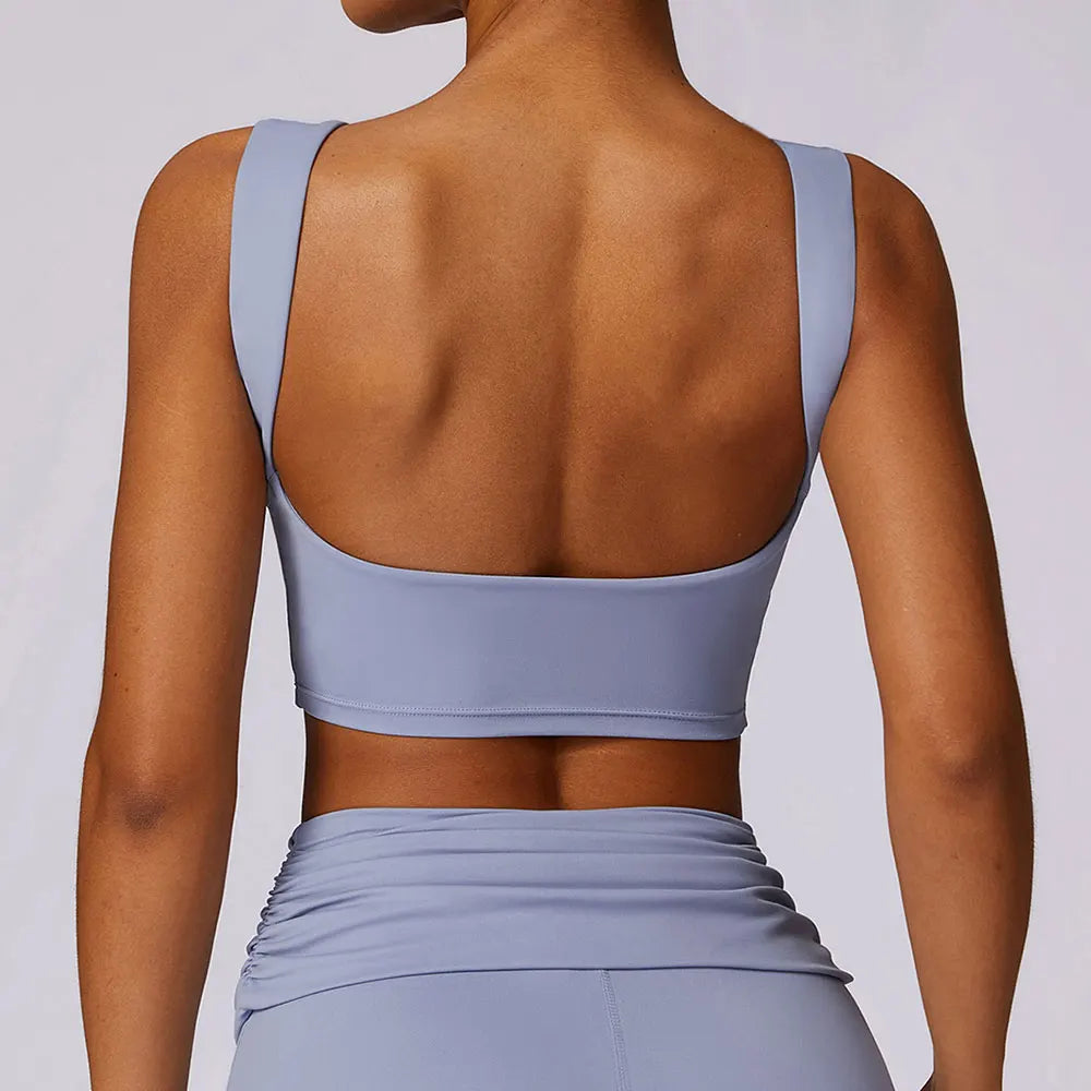 Women’s backless sports bra crop top in light blue with wide open-back straps