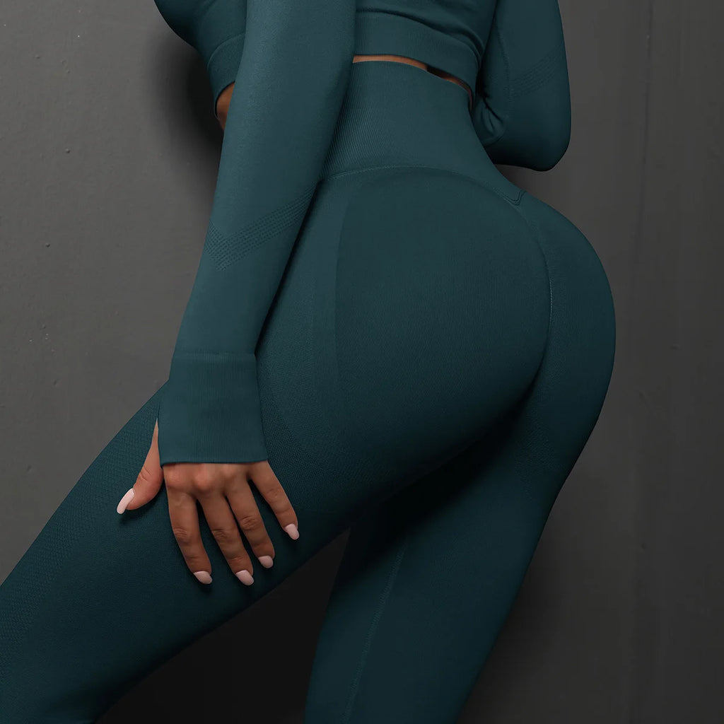 High-waist yoga leggings, dark teal, close-up of back contour seam details