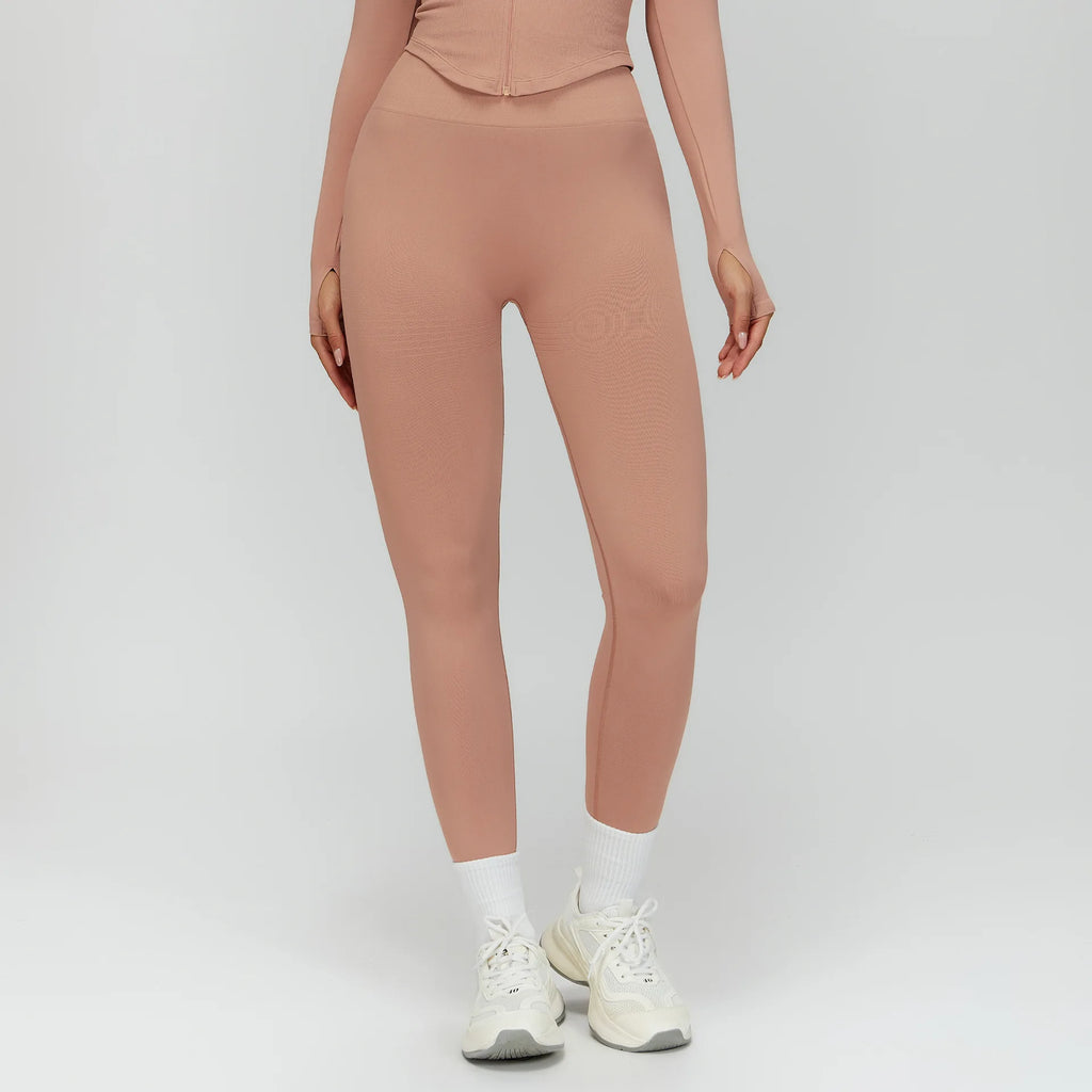 High-waisted active leggings in peach pink, ankle-length