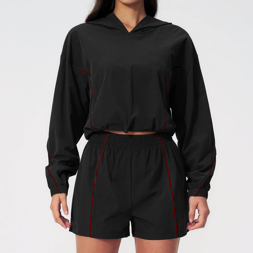 Women's hooded windbreaker jacket and drawstring shorts set, black with red trim