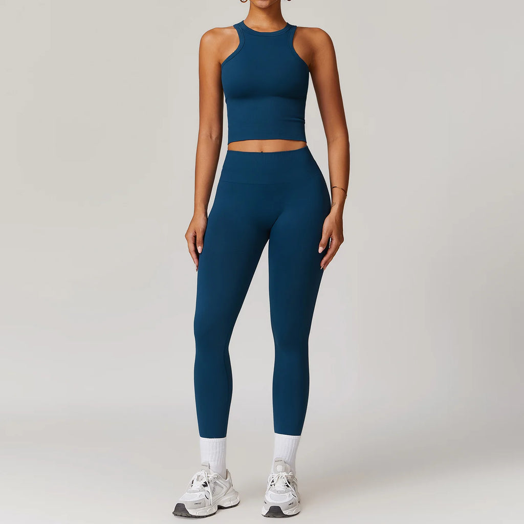 Royal blue sleeveless tank and matching leggings workout set, cropped waist cutout