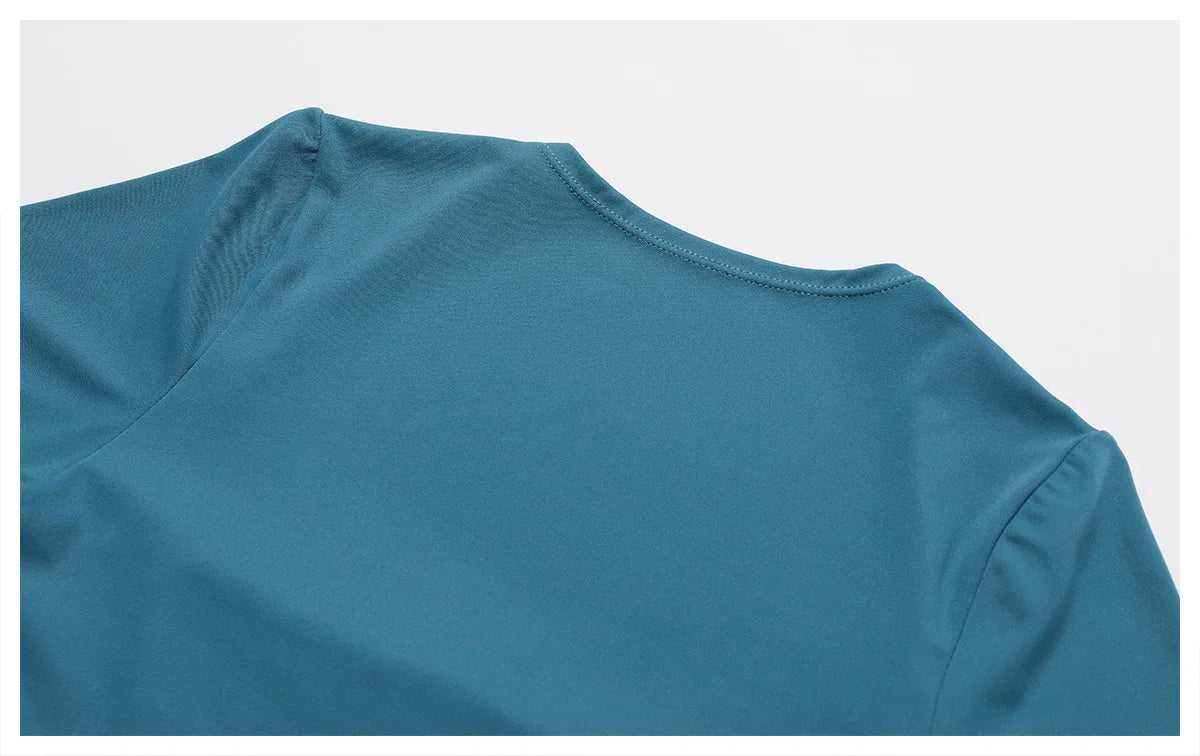 Women's peacock blue short-sleeve yoga bodysuit crew neckline