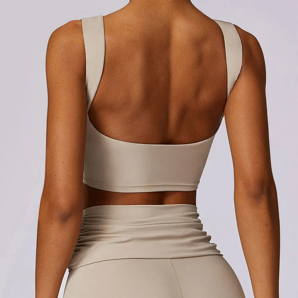 Women’s backless sports bra crop top in light tan with wide open-back straps