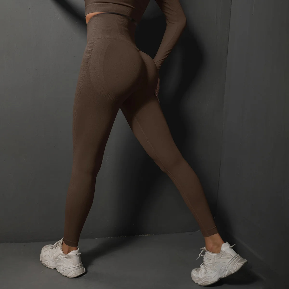 High-waist brown seamless yoga leggings with scrunch back and fitted leg