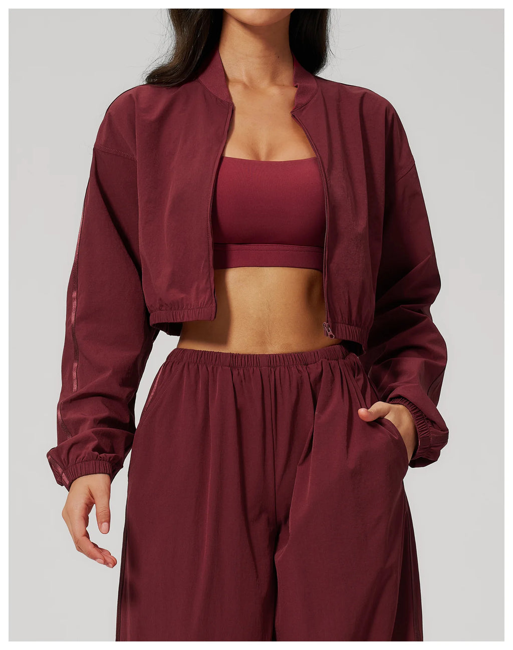 Women’s cropped yoga jacket, deep maroon, open front with long sleeves and zipper