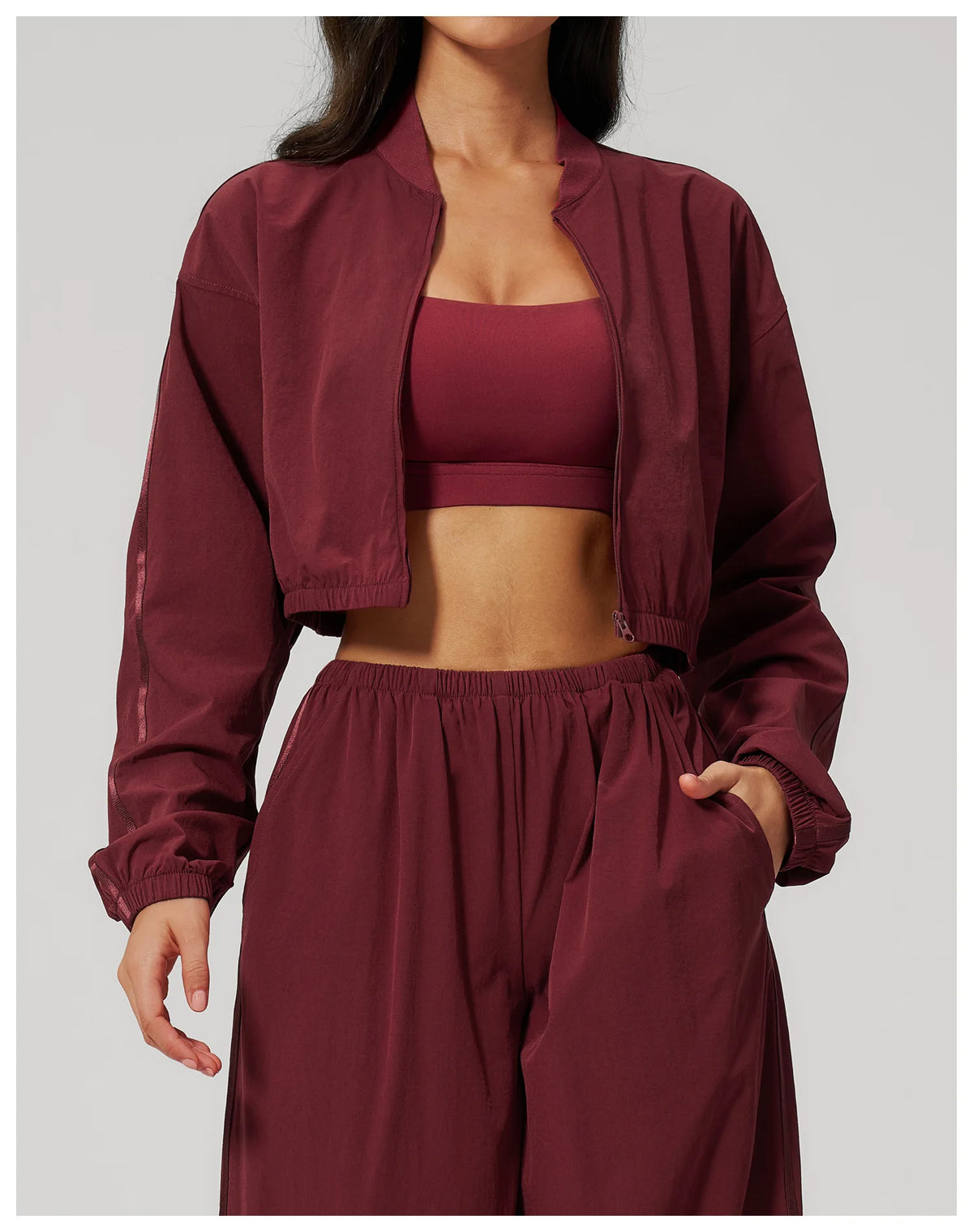 Women’s cropped yoga jacket, deep maroon, open front with long sleeves and zipper