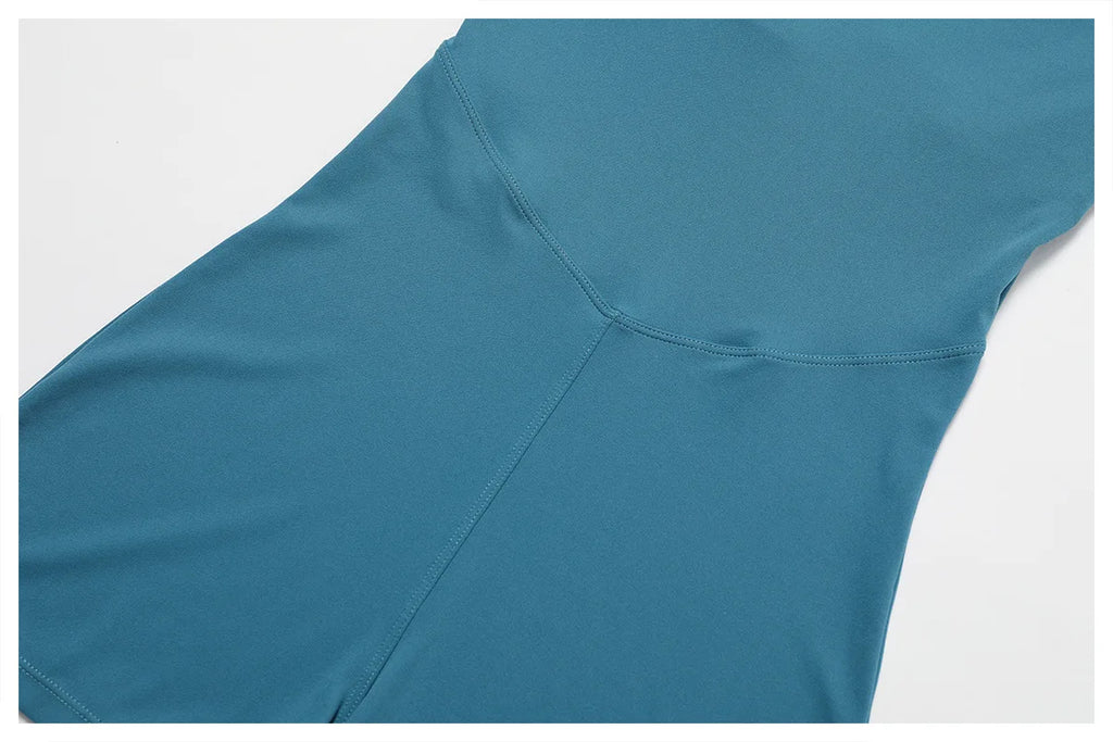 Women's peacock blue yoga bodysuit side seam and back neckline curve