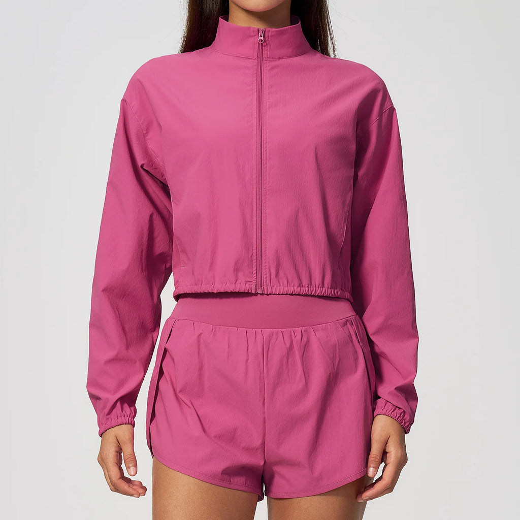 Strawberry powder zip-front women's sports jacket with stand collar and long sleeves