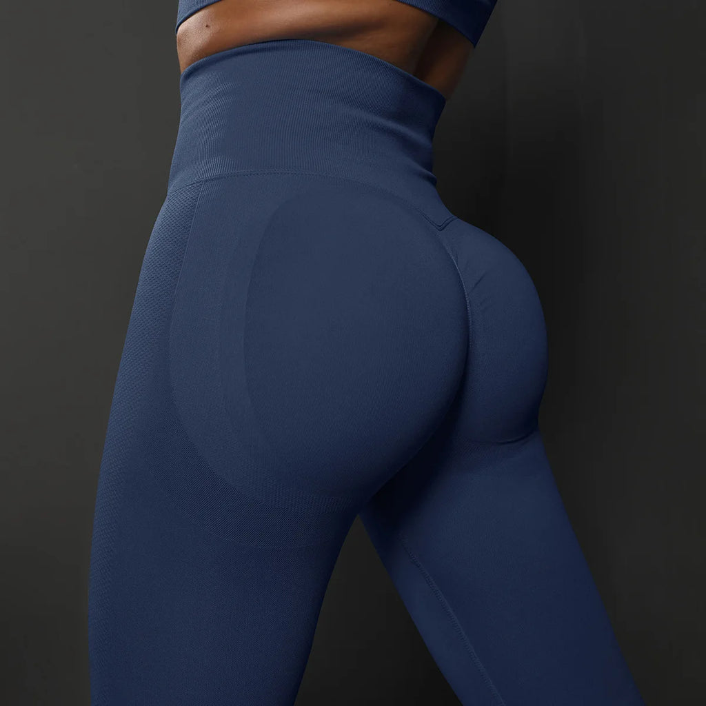 High-waist dark blue seamless yoga leggings, scrunch back detail on hips