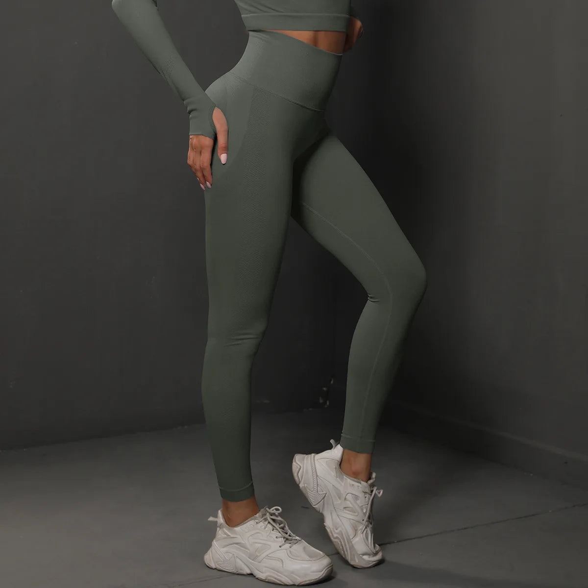 High-waist yoga leggings, muted gray-green, side view with ankle-length fit