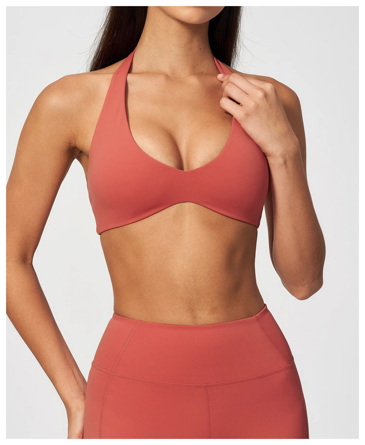Coral red halter neck yoga bra with V front and stretchy racerback strap