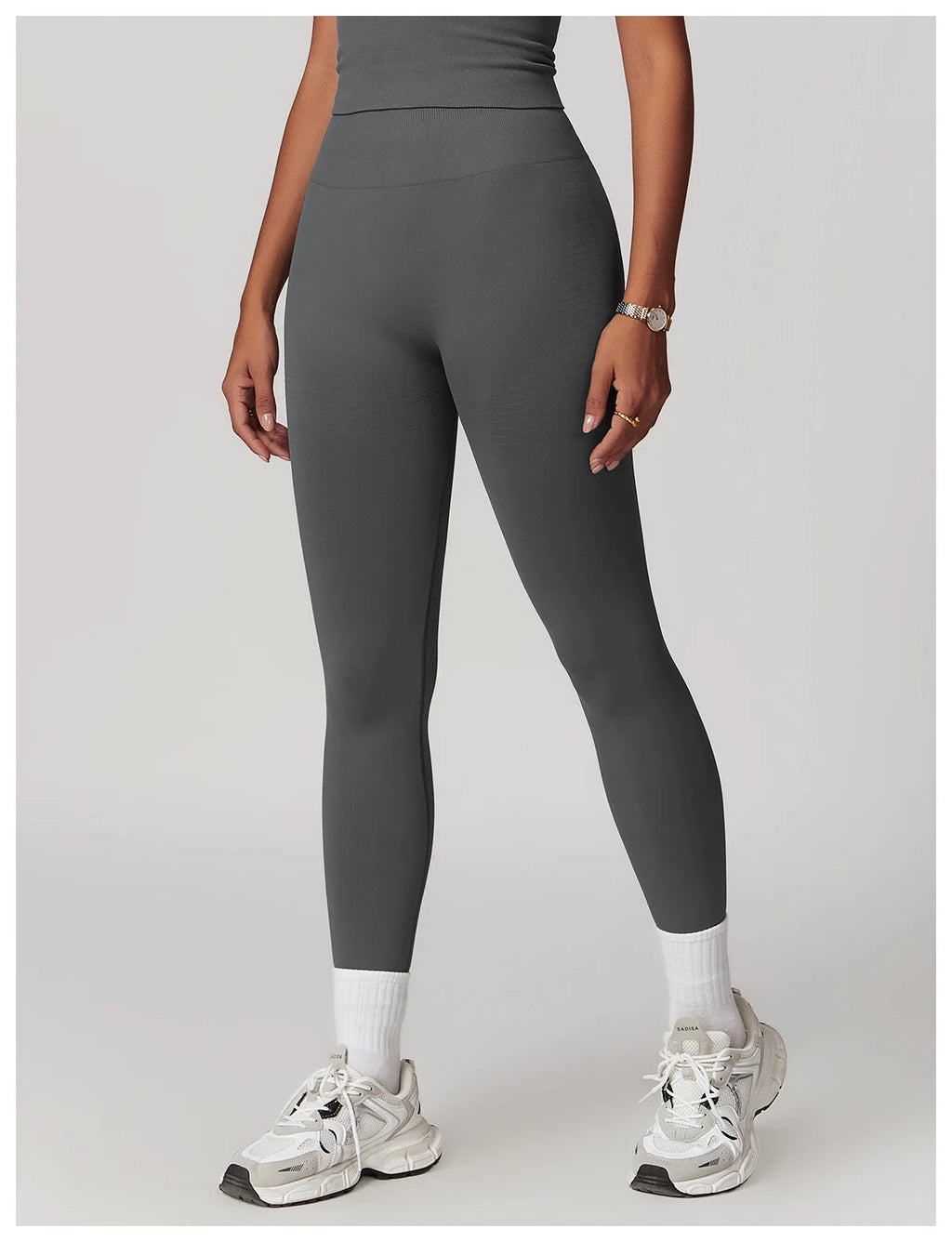 High-waisted active leggings in charcoal gray, full-length fitted legs