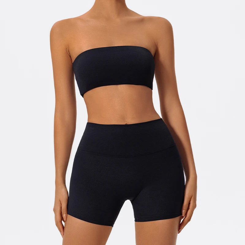 Two-piece fitness set with dark navy strapless bandeau bra and matching biker shorts