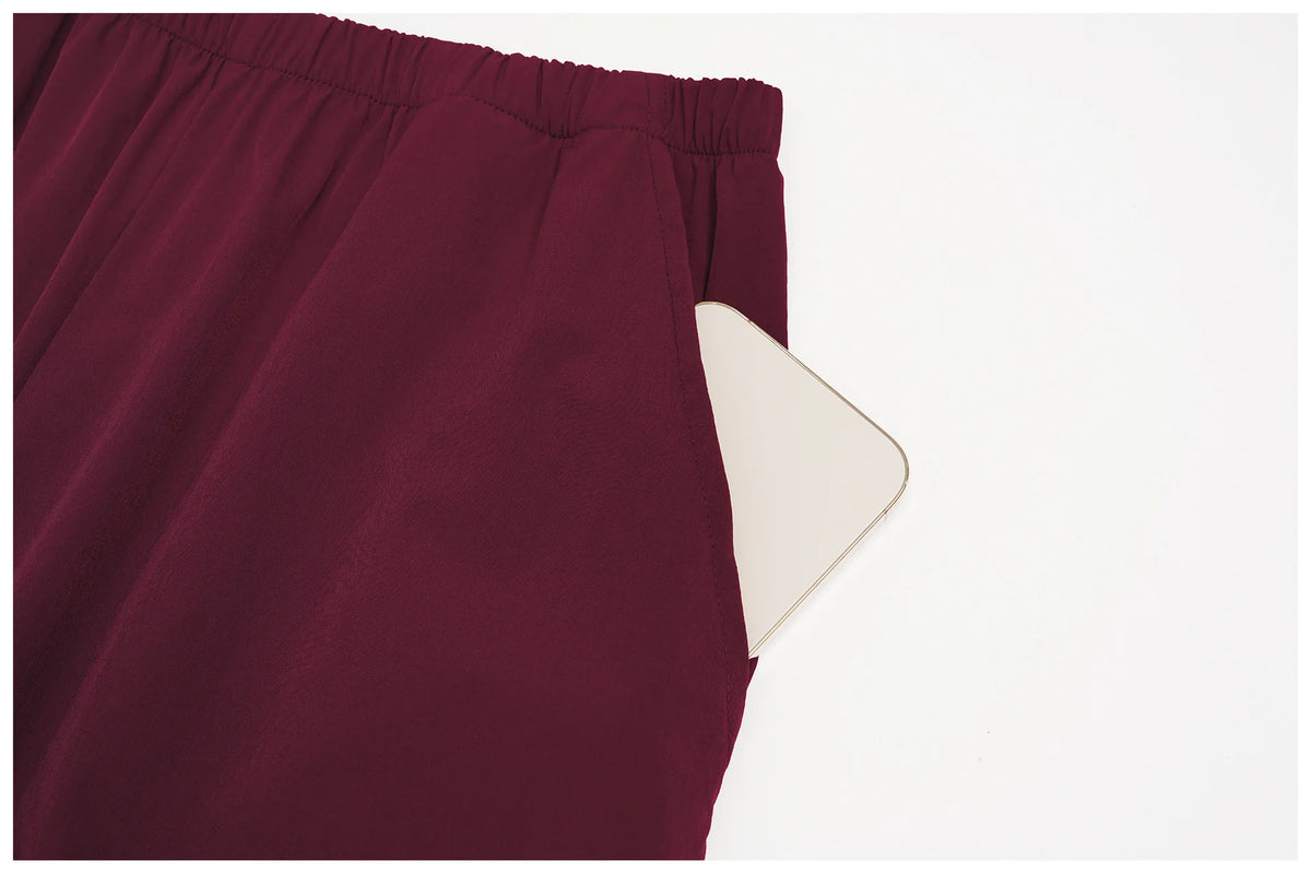 Women's burgundy wide-leg pants with elastic waist and side pocket