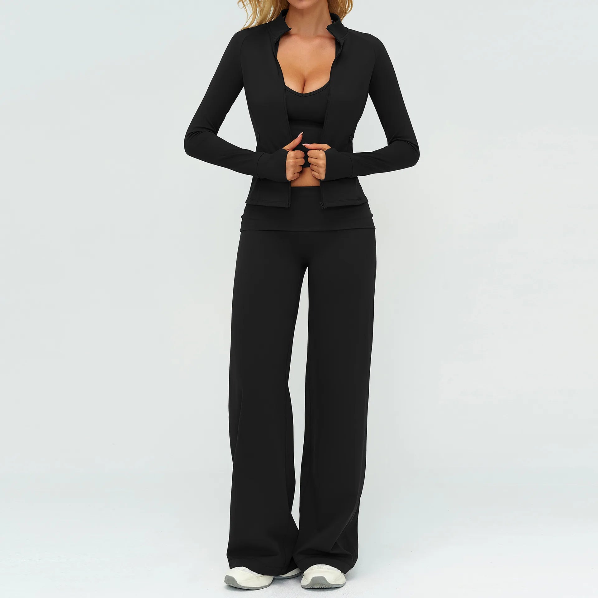 Black long-sleeve jacket with deep V design and wide-leg flare pants, matching set