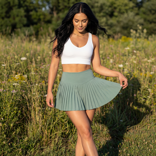 Palm Green tennis skort with pleated flare skirt and elastic waistband