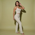Silver Grey set: halter crop tank and high-waisted flared pants, side pose