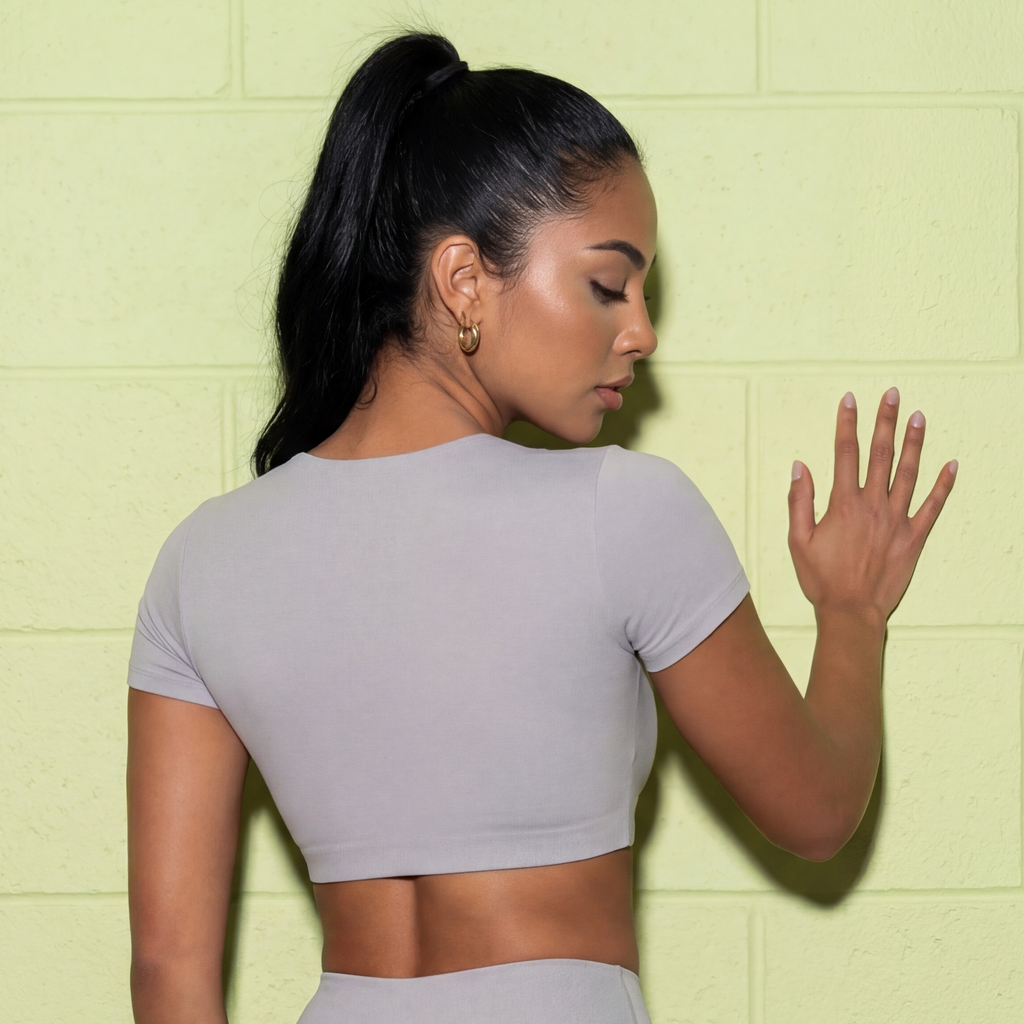 Fitted yoga crop top, light gray, short sleeves and crew neck, back view