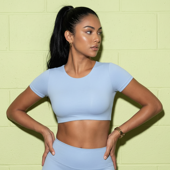 Fitted yoga crop top, light blue, short sleeves and crew neck