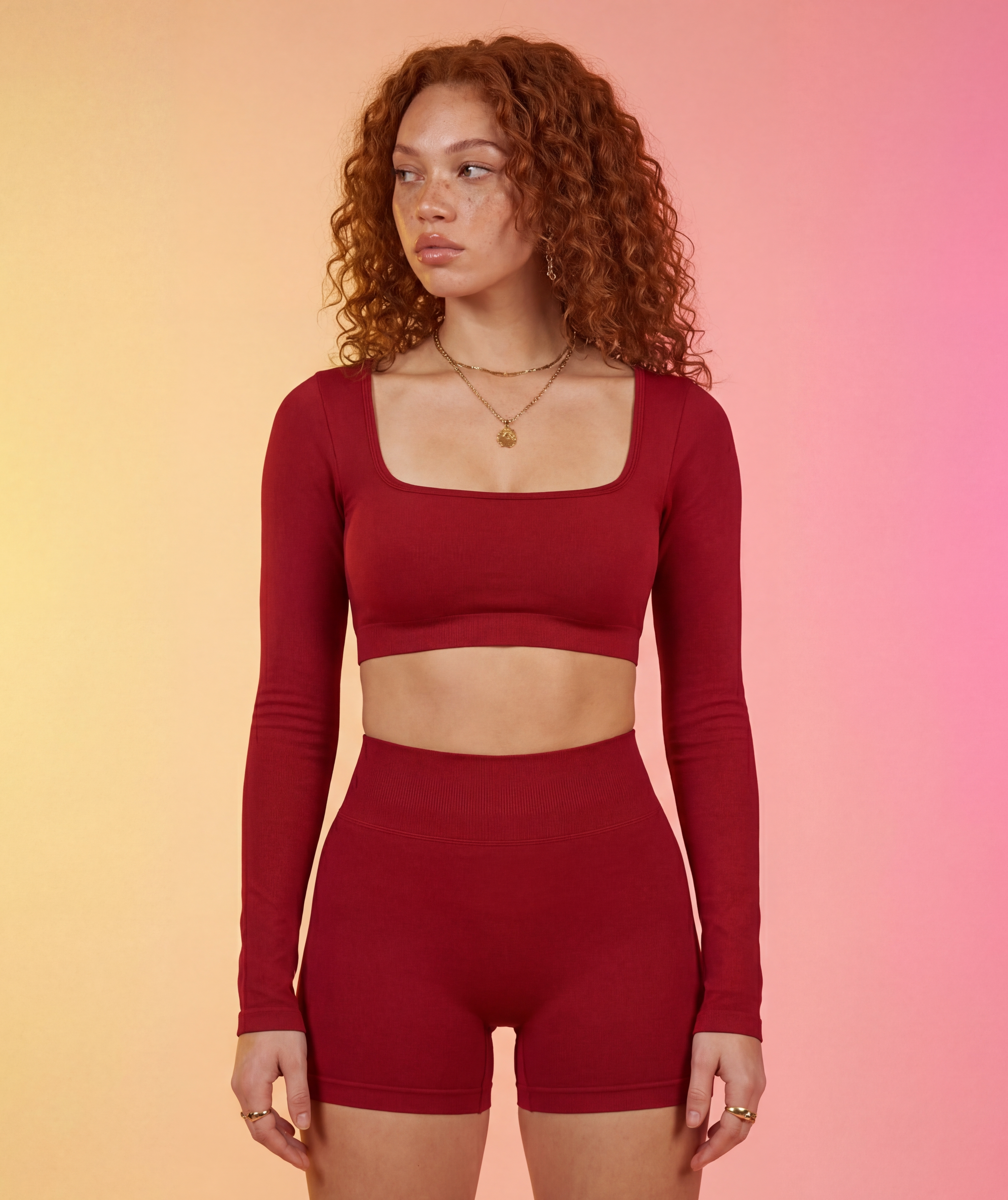 Wine red long-sleeve square-neck crop top and high-waisted shorts set, front view