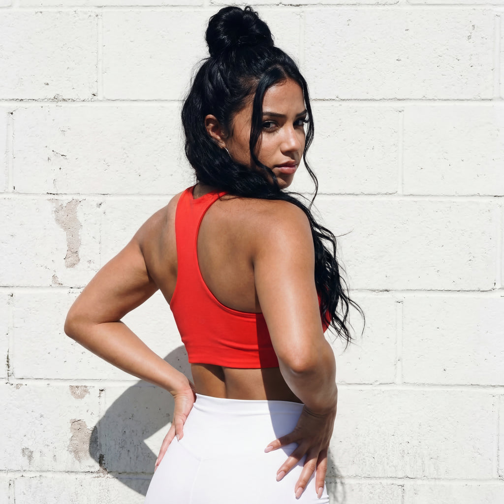 Red sports bra back view with wide straps and criss-cross X detail