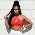 Red active sports bra with front criss-cross straps and keyhole cut-out
