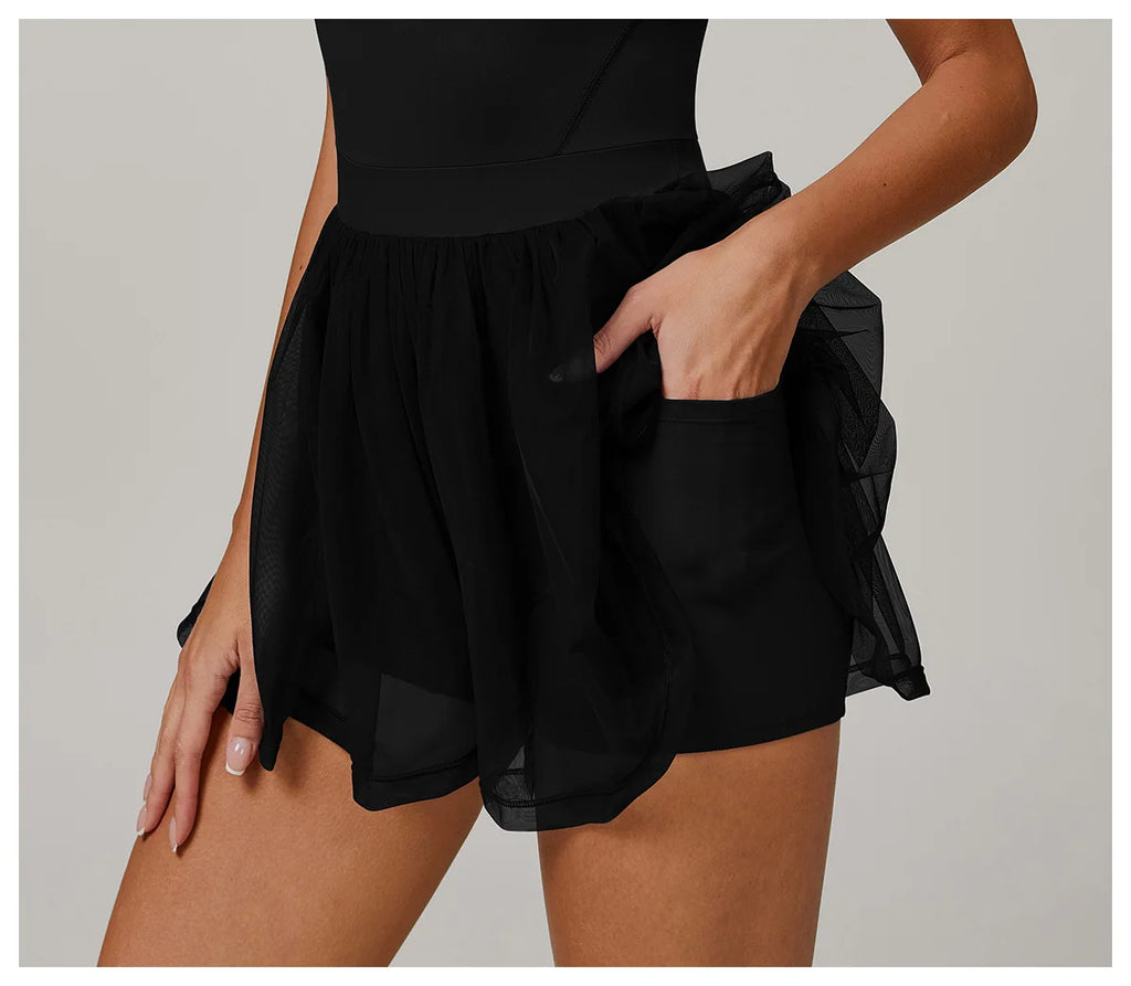 Close-up of black gathered sheer tulle skirt with fitted base