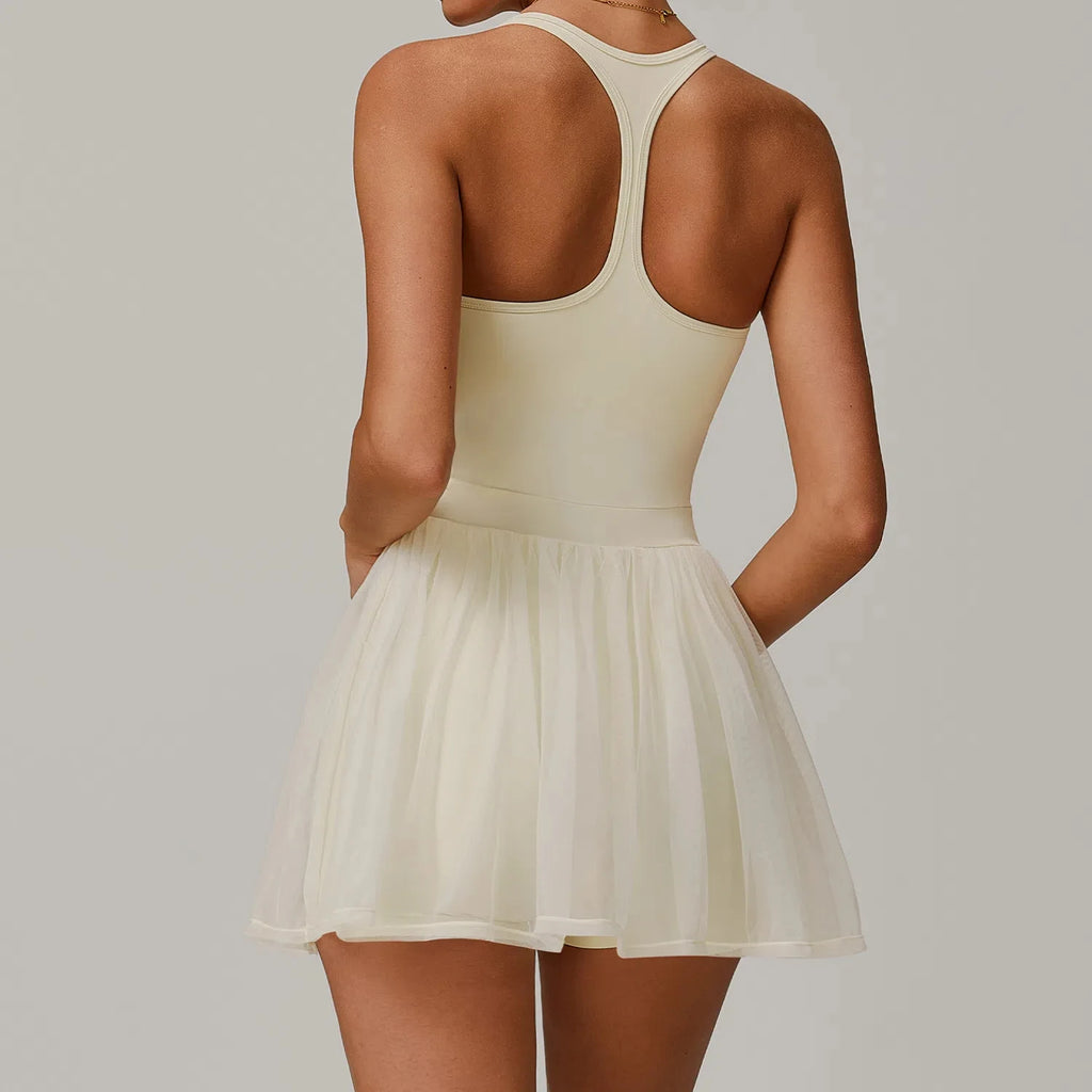 Light ivory active dress back view with racerback straps and sheer tulle skirt