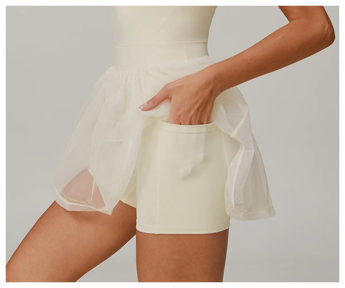 Light ivory active skirt dress with visible side pocket in sheer tulle layer